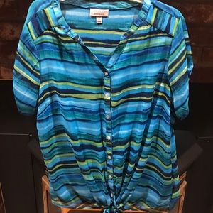 100% polyester button-up blouse.